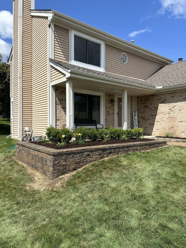 Greener Grounds Lanscape brick wall and landscaping.