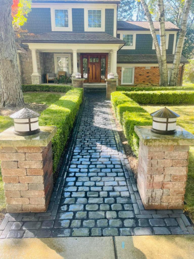 Greener Grounds Lanscape brick walkway, columns, and landscaping.
