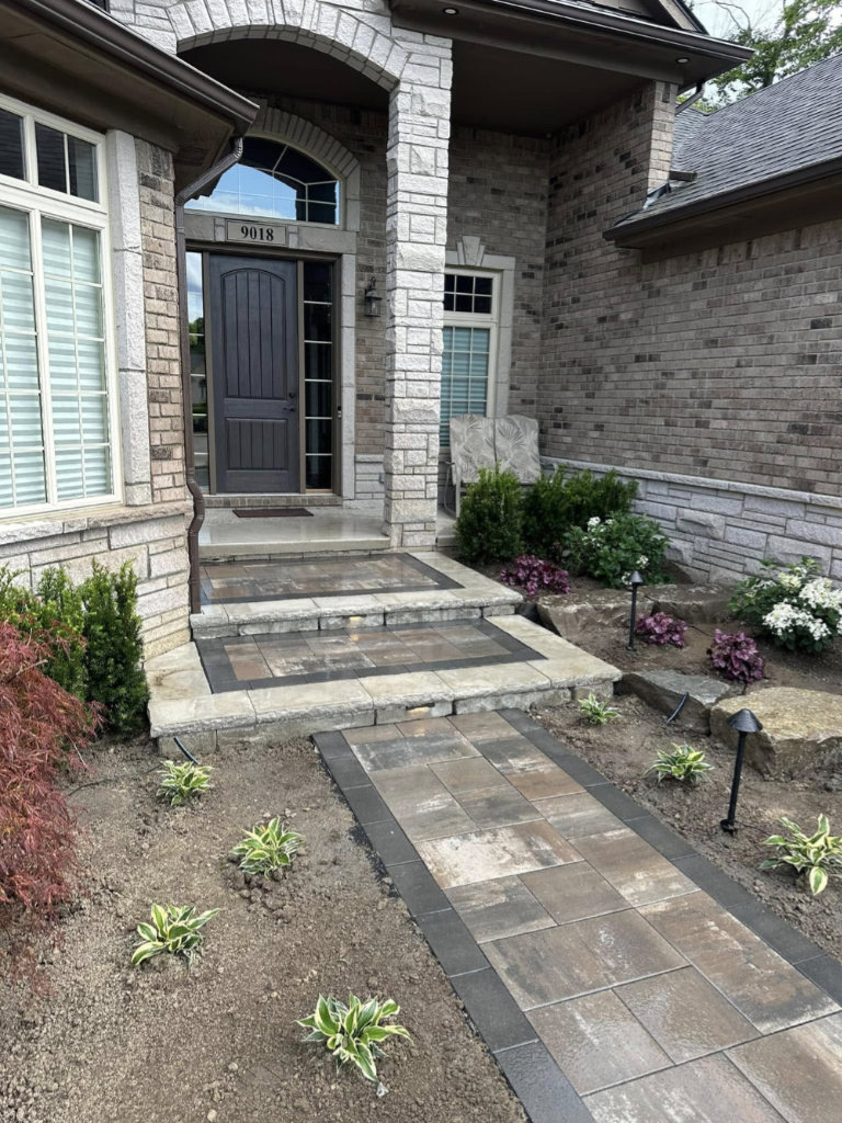 Greener Grounds Lanscape brick walkway, steps, and landscaping.
