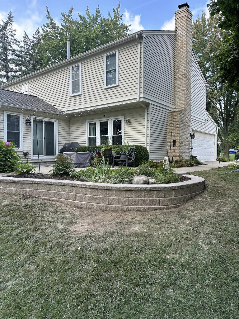 Greener Grounds Lanscape brick wall.