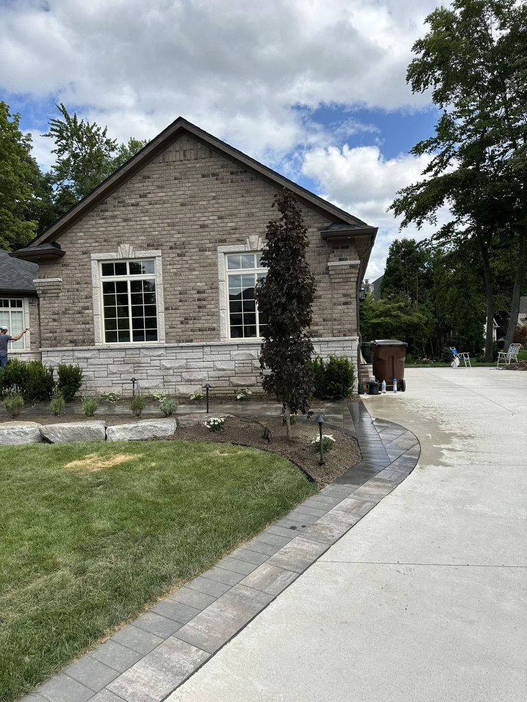 Greener Grounds Lanscape stone and brick walkway and landscaping.