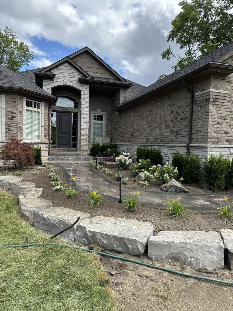 Greener Grounds Lanscape stone and brick walkway and landscaping.