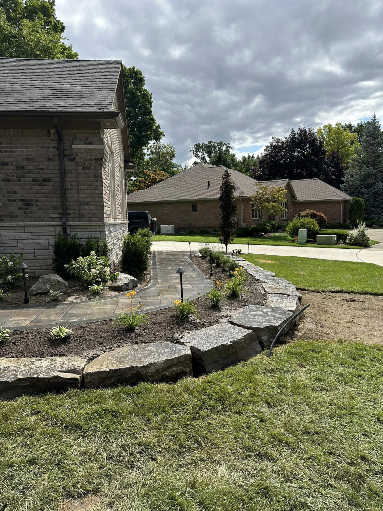 Greener Grounds Lanscape stone and brick walkway and landscaping.