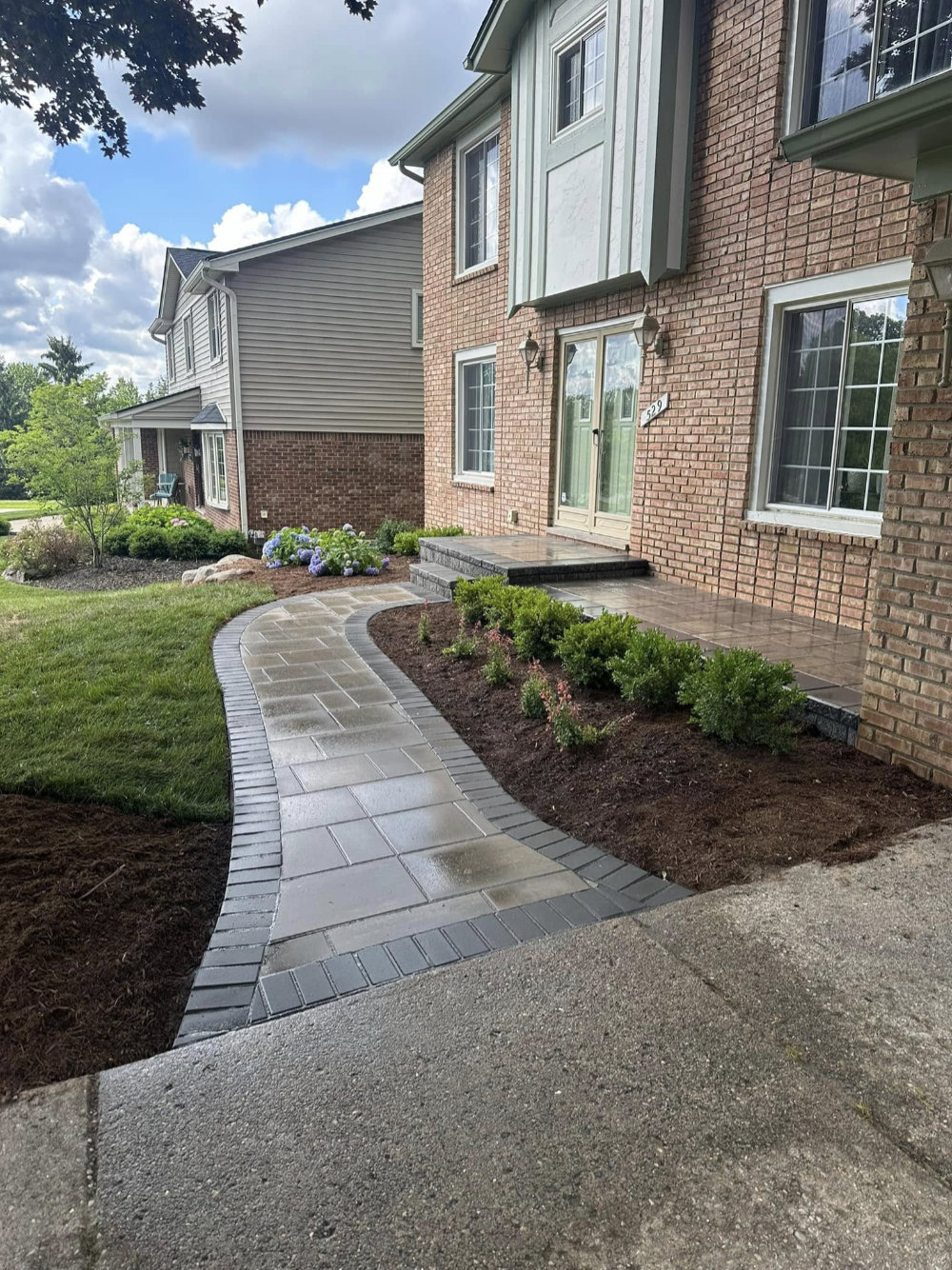 Greener Grounds Lanscape brick walkway and landscaping.
