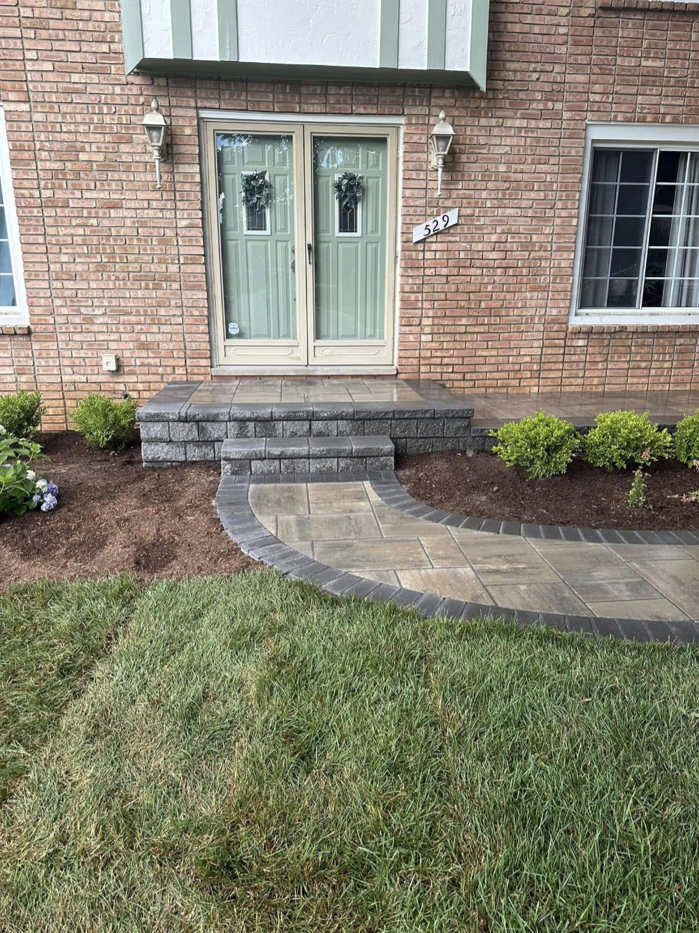 Greener Grounds Lanscape brick walkway and landscaping.